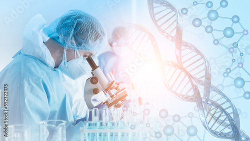 research and developement concept background scientist or reseacher using microscope in biotechnology laboratory  overlay with DNA strand and molecules symbo; . concept of DNA engineering