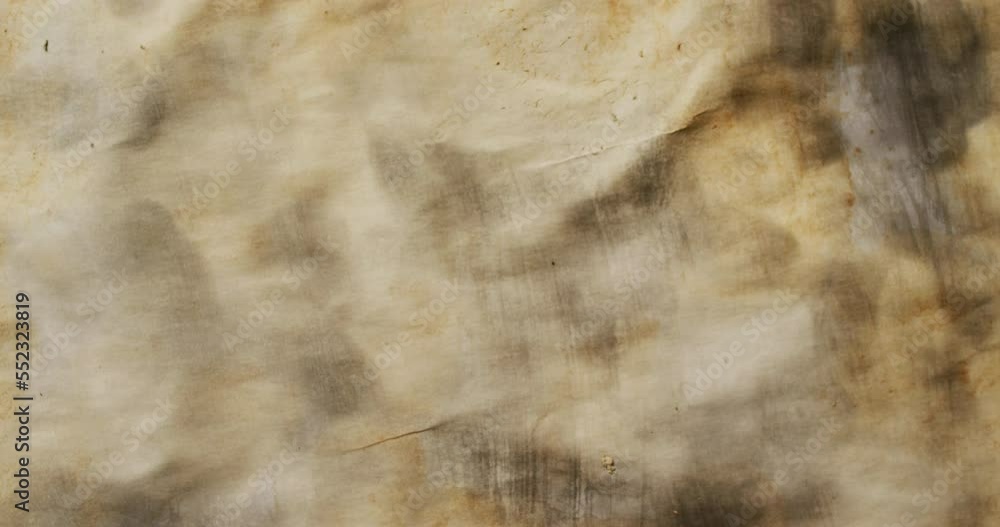 Video of close up of piece of paper with burned edges on white background Video of close up of piece of paper with burned edges on white background