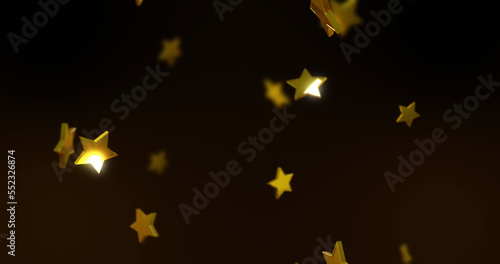Image of gold stars falling over black background