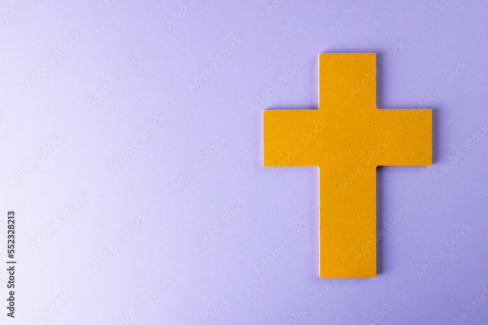 Composition of christian ash wednesday cross on purple background with copy space Composition of christian ash wednesday cross on purple background with copy space