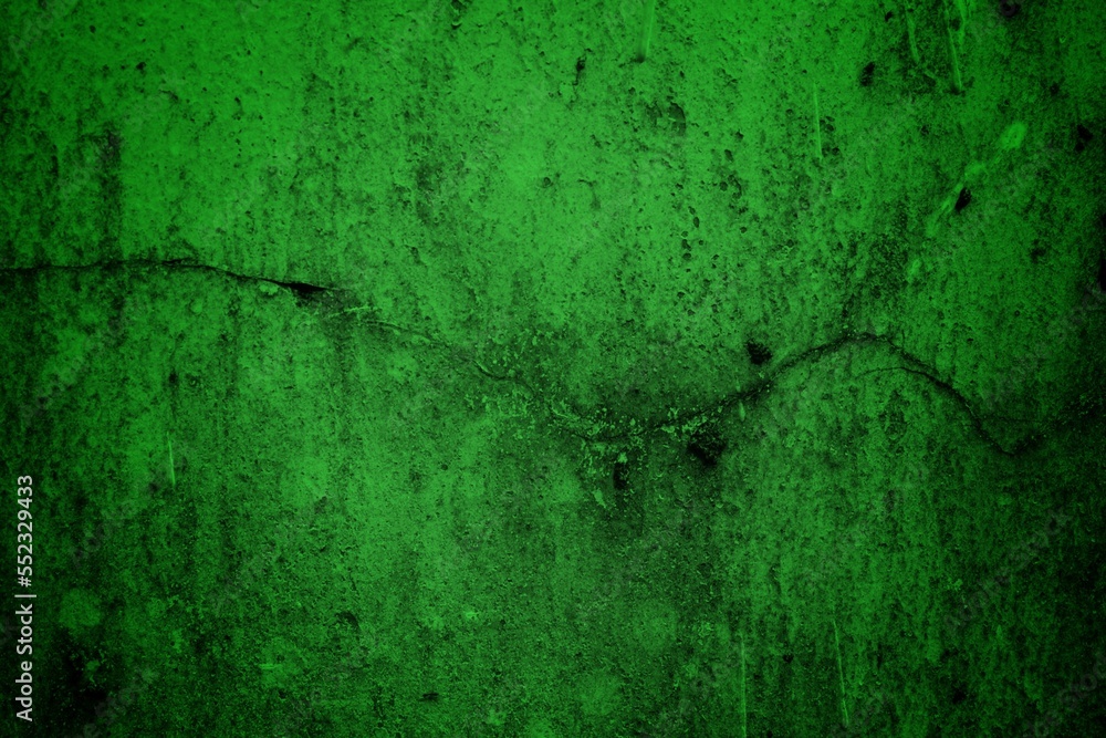 green textured wall background with dark side, green granite stone wall