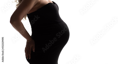 banner. without a face. a pregnant woman in a black dress on a white background