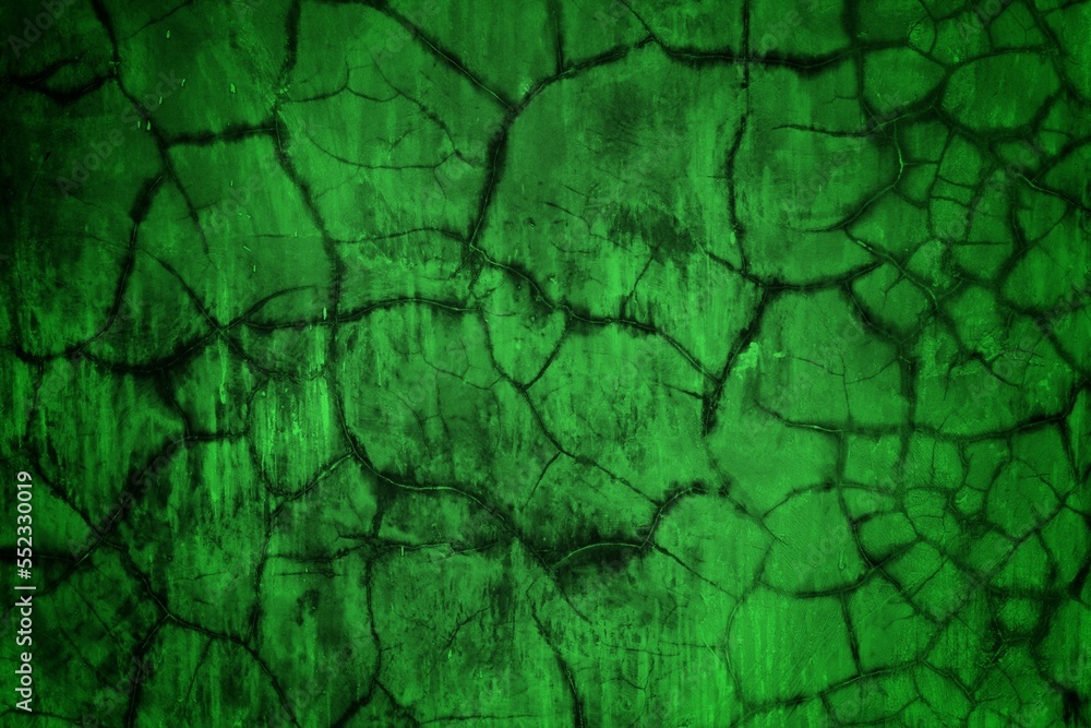 green textured wall background with dark side, green granite stone wall