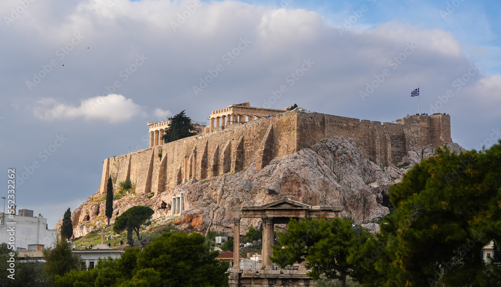 The Acropolis hill landmark from Athens, photographed from the Temple of Hadrian building. Travel to Greece.