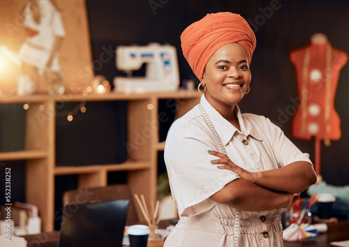 Fashion, designer and african or black woman in portrait for small business startup, creative career or textile industry in a workshop studio. Fabric, manufacturing and retail clothes of proud woman photo
