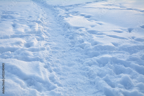 Path in deep white snow, winter season in Poland.
