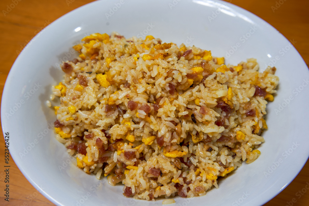 A delicious Chinese home cooking dish, sausage and egg fried rice A delicious Chinese home cooking dish, sausage and egg fried rice