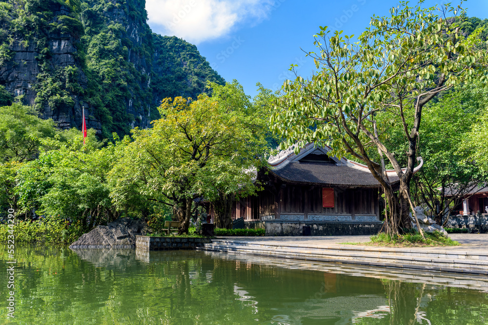 An ancient temple in Trang An tourist complex, Ninh Binh province, Vietnam. Trang An is recognized by Unesco as a world cultural heritage. An ancient temple in Trang An tourist complex, Ninh Binh province, Vietnam. Trang An is recognized by Unesco as a world cultural heritage.