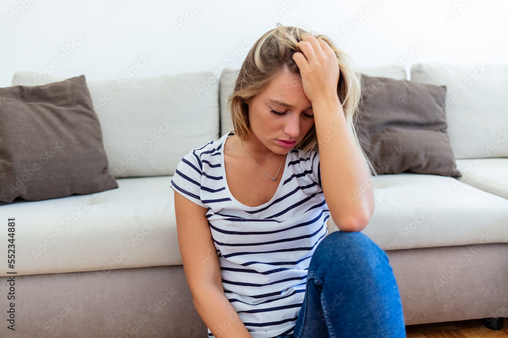 Depression, mental health and woman thinking about a sad memory feeling upset and grief after suffering a loss. Stressed, depressed and disappointed girl worried about a personal problem at home. Depression, mental health and woman thinking about a sad memory feeling upset and grief after suffering a loss. Stressed, depressed and disappointed girl worried about a personal problem at home.