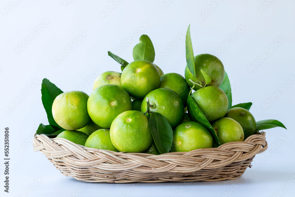 Fresh green oranges in basket , Fresh green oranges at market and shop for sell..Fresh green lemons, in basket , Fresh green lemons at market and shop for sell. Fresh green oranges in basket , Fresh green oranges at market and shop for sell..Fresh green lemons, in basket , Fresh green lemons at market and shop for sell.