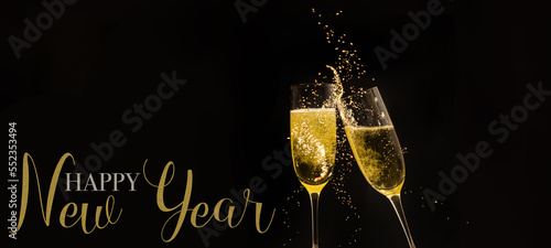 HAPPY NEW YEAR 2024 celebration holiday greeting card background banner  - Champagne or sparkling wine glasses toasting in the black night