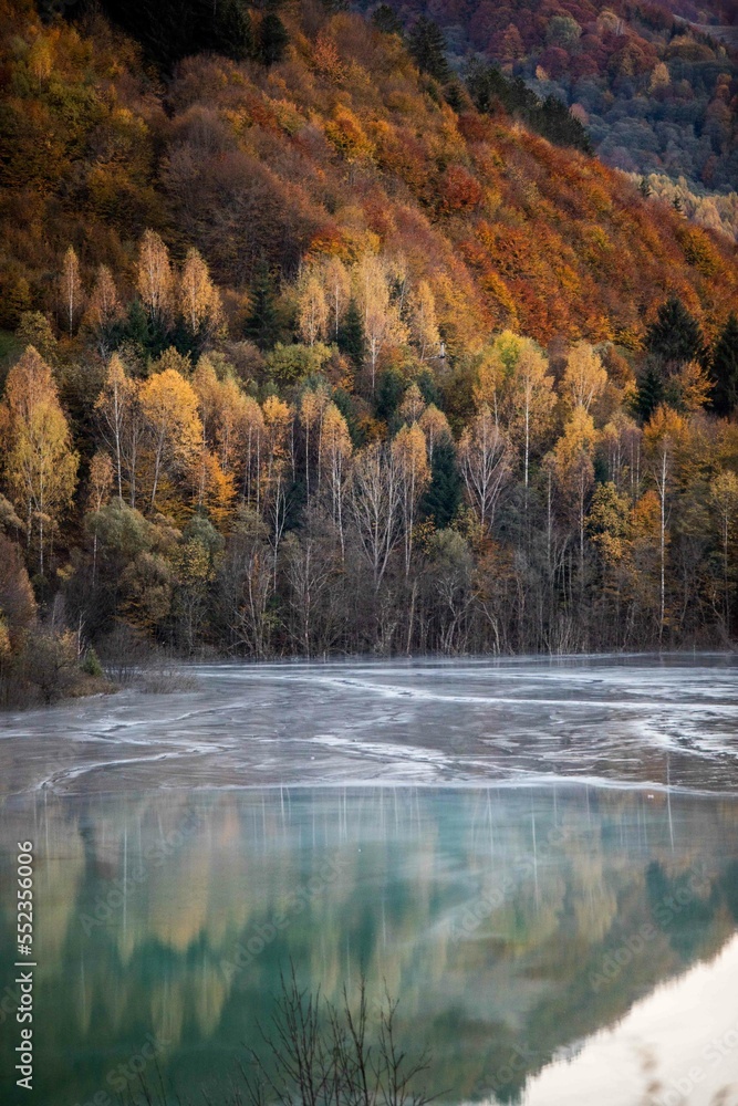 Autumn landscape with trees and river in the mountains Autumn landscape with trees and river in the mountains