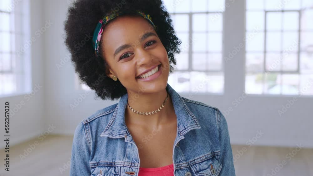 Black woman afro, face and smile for fashion style, confidence or empowerment in apartment building. Portrait of happy African American female smiling in happiness for vision or aspiration Black woman afro, face and smile for fashion style, confidence or empowerment in apartment building. Portrait of happy African American female smiling in happiness for vision or aspiration