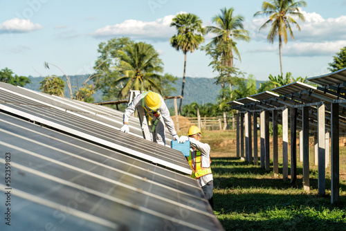 In village greenery tree maintenance engineer as team carry ladder check inspection solar panel