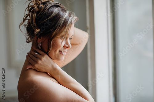 a delicate and sensual portrait of a middle-aged woman.