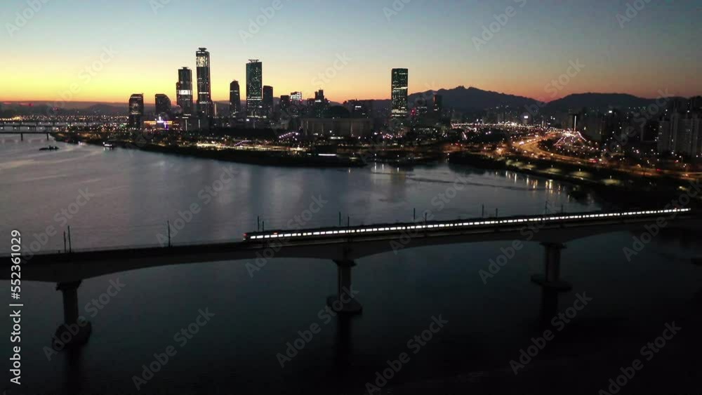 Aerial view of Seoul city,South Korean Metropolitan Railway runs across the Han River in the morning. Aerial view of Seoul city,South Korean Metropolitan Railway runs across the Han River in the morning.
