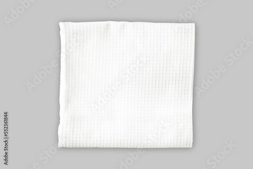 White folded kitchen waffle towel mockup isolated on a background. 3d rendering.