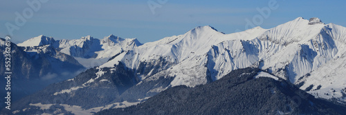 Snow covered mountain range near Rougemont, Switzerland. photo