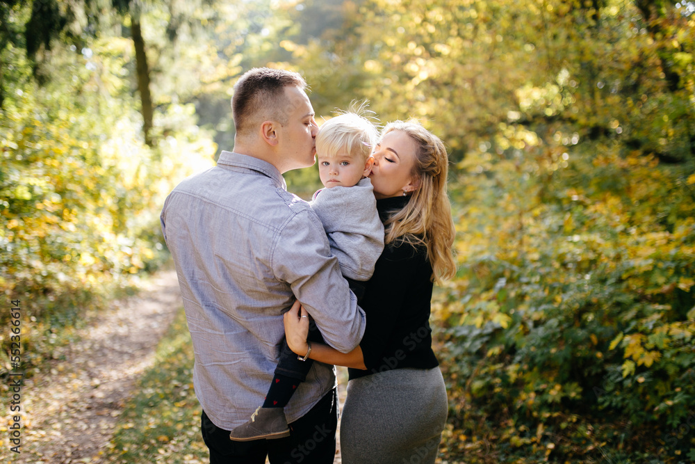 happy family playing and laughing in autumn park happy family playing and laughing in autumn park