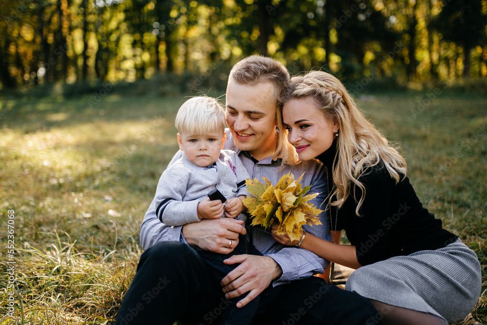 happy family playing and laughing in autumn park happy family playing and laughing in autumn park