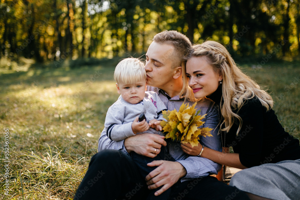 happy family playing and laughing in autumn park happy family playing and laughing in autumn park