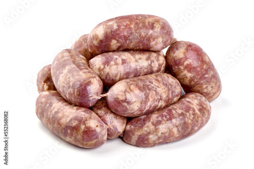 Raw pork sausages, isolated on white background.