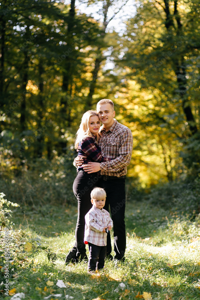 happy family playing and laughing in autumn park happy family playing and laughing in autumn park