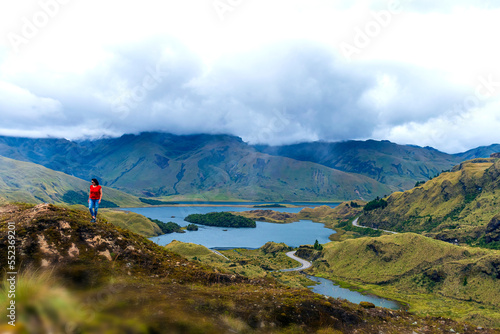 traveler in lagoons of atillo ecuador mountain range of the andes
 photo