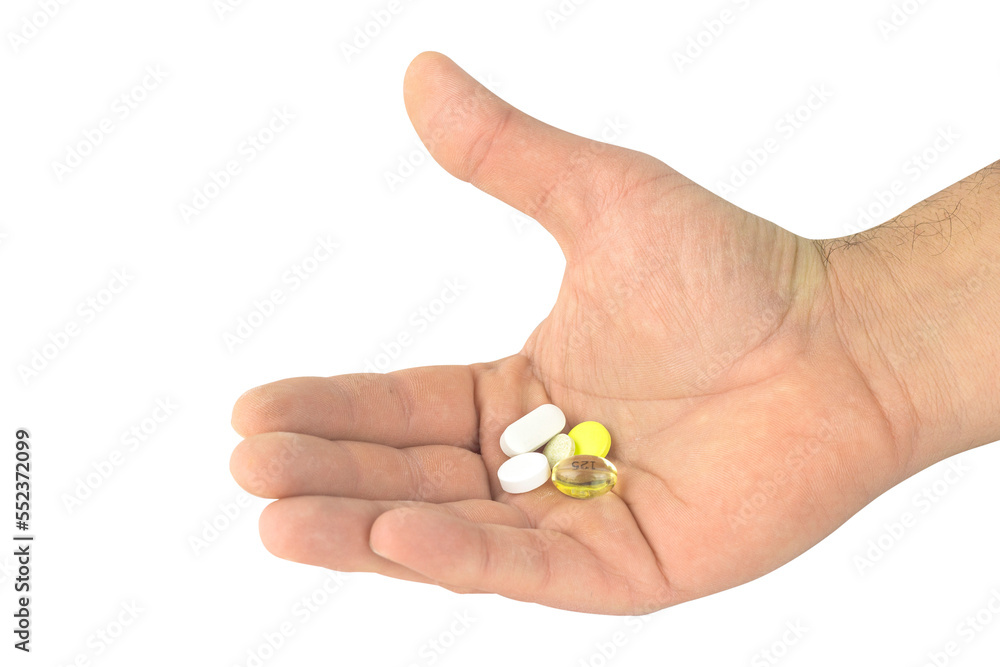 pills in outstretched hand isolated from background pills in outstretched hand isolated from background