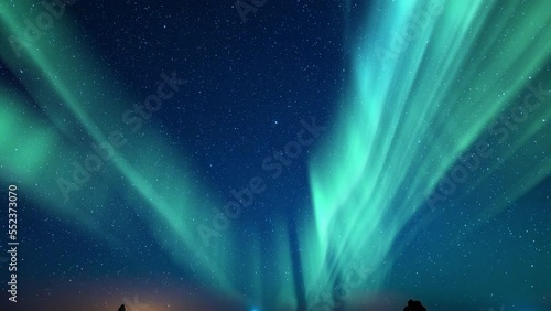 Aurora Green and Milky Way Galaxy Over Iceberg Tilt Down