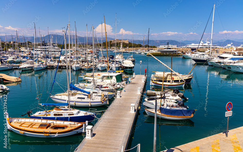 Panoramic view of Vauban port and yacht marina with medieval Bastion Saint Jaume walls onshore Azure Cost of Mediterranean Sea in Antibes resort town in France