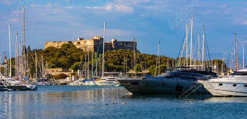 Panoramic view of harbor, port and yacht marina and Fort Carre castle offshore Azure Cost of Mediterranean Sea in Antibes resort town in France