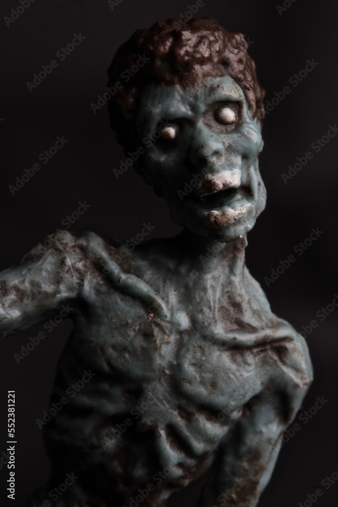 miniature figurine detail of a zombie