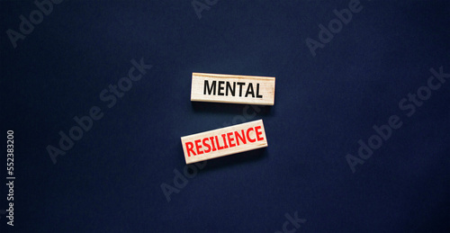 Mental resilience symbol. Concept word Mental resilience typed on wooden blocks. Beautiful black table black background. Business psychological and mental resilience concept. Copy space.