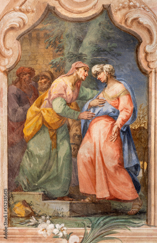 CHIAVENNA, ITALY - JULY 20, 2022: The fresco of Visitation in the church San Lorenzo by Filippo Fiori e Giovanni Maria Giussani from Como (1759).