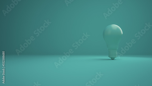 Cyan Lightbulb on a cyan background. Horizontal composition with negative space on the left. Concept of Creativity and innovation. 