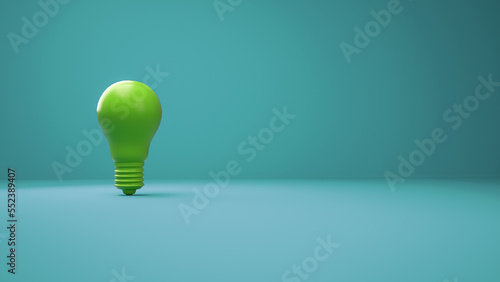 Green Lightbulb on a cyan background. Horizontal composition with negative space on the right. Concept of Creativity and innovation. Green earth.