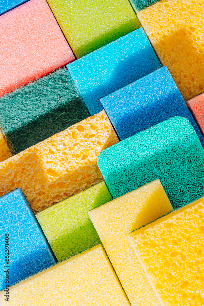 cleaning sponge background. sponges for cleaning different colors and different sizes
