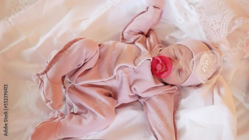 Wallpaper Mural newborn baby girl sleeping with pacifier. baby sleeps with a pacifier in a hat in bed. happy family childish calm concept. newborn baby sleeping at night close up with pacifier. baby cute sleeps fun Torontodigital.ca