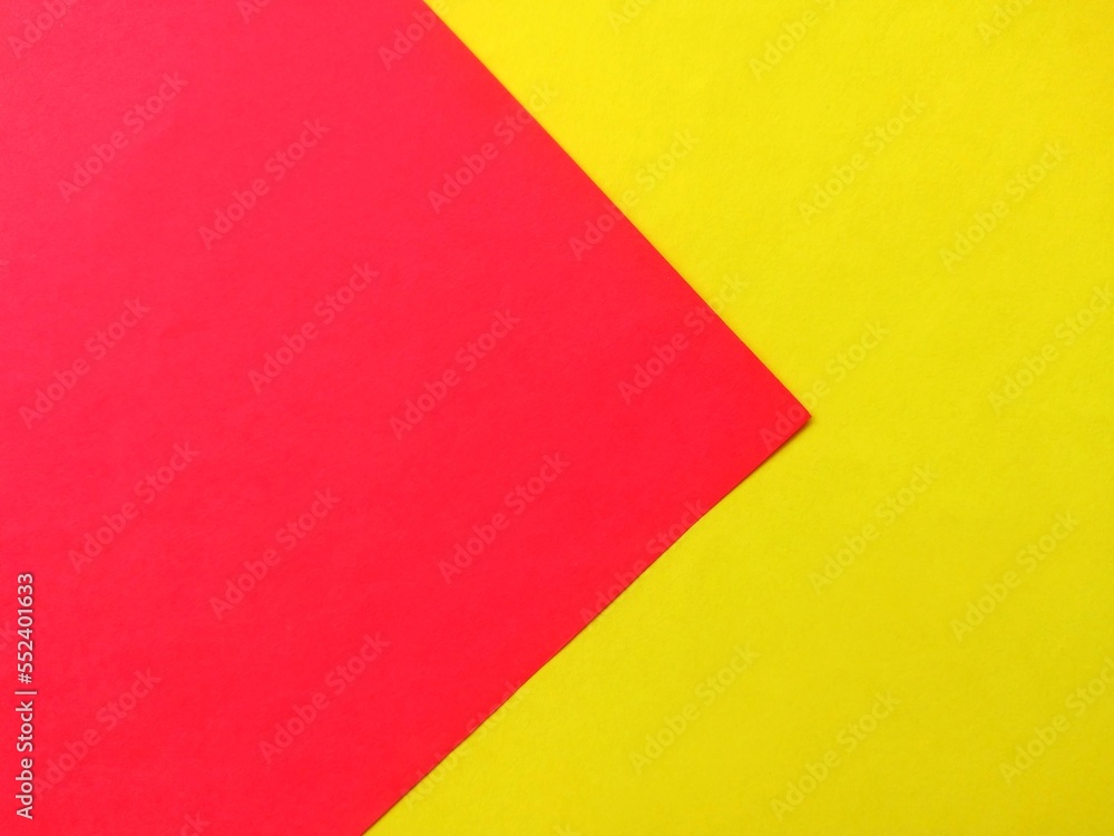 Red and yellow paper, Modern flat lay background with color paper sheets. 