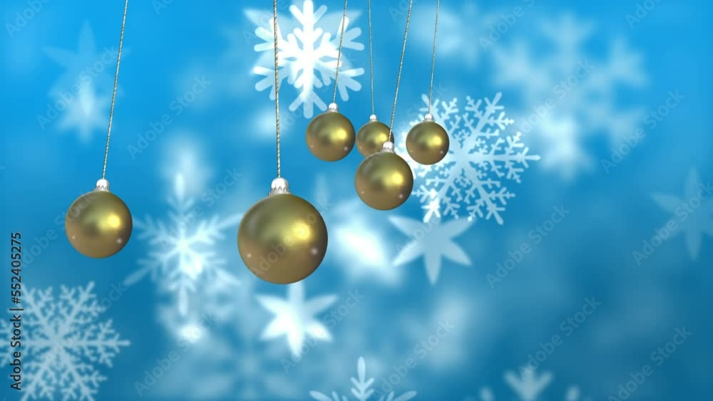 Animation of christmas baubles dangling over snow falling on blue background Animation of christmas baubles dangling over snow falling on blue background