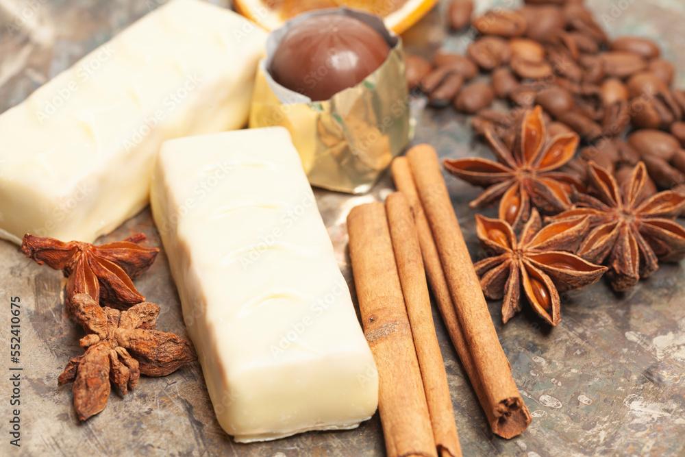 White chocolate candies with anise,cinnamon sticks,coffee beans. White chocolate candies with anise,cinnamon sticks,coffee beans.