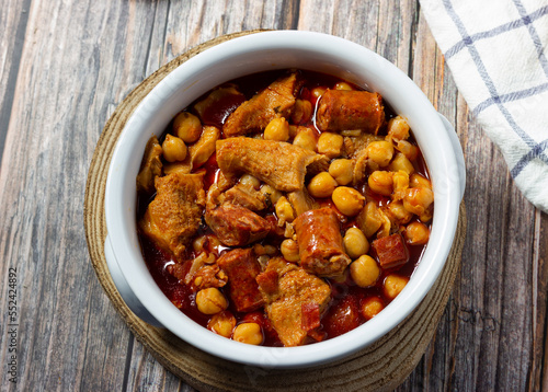 Top view of tripe casserole with chickpeas. Winter comfort food. (Callos a la madrileña)