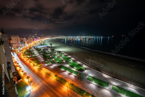 Panoramic view over the buildings downtown Tanger at night in Morocco