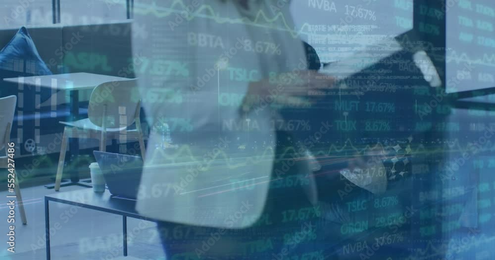 Animation of trading board, binary code, database over caucasian coworkers discussing over laptop Animation of trading board, binary code, database over caucasian coworkers discussing over laptop