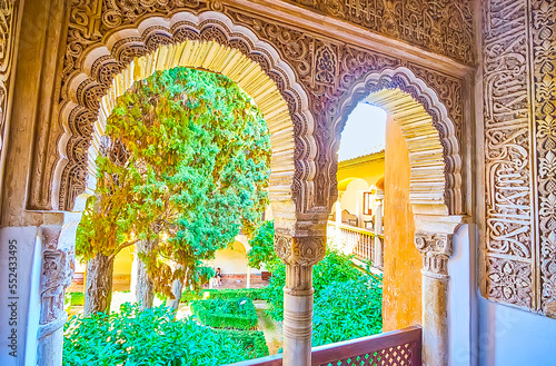 The view on Daraxa's Garden through the windows of Lions Palace, Alhambra, Granada, Spain photo