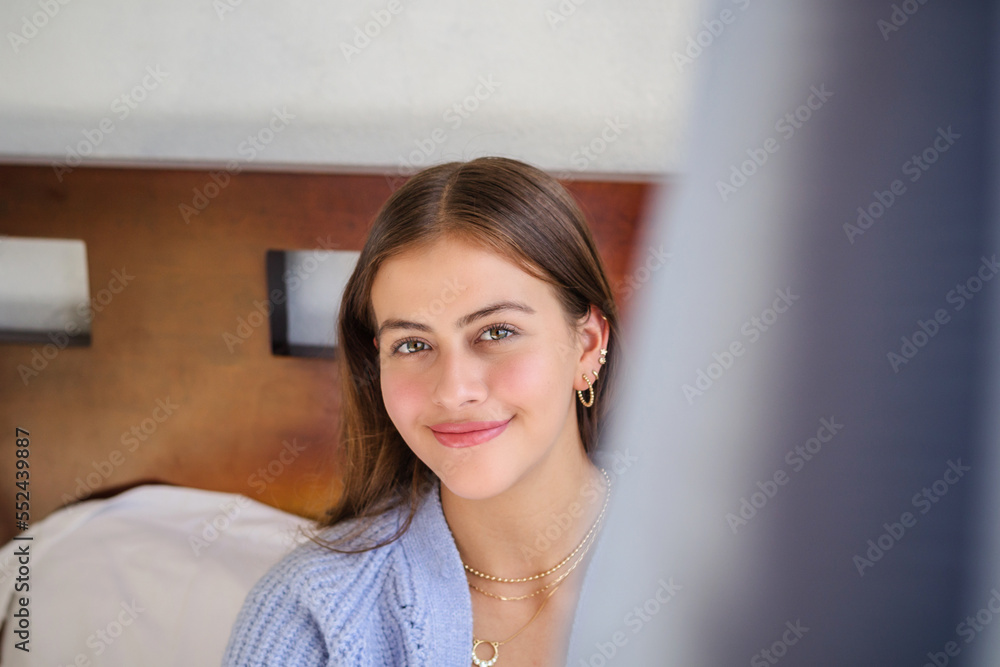 adorable female teen at home smiling looking at camera adorable female teen at home smiling looking at camera