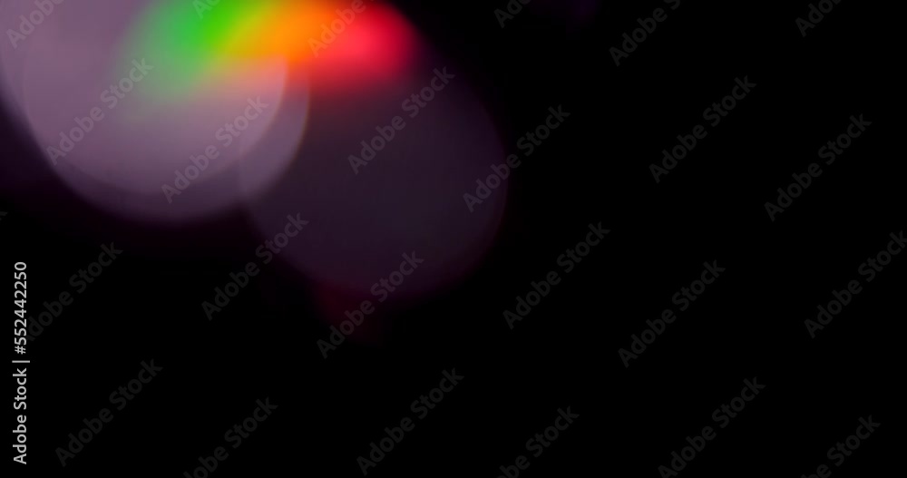 Rainbow prism lens flare Light Leak overlay on black background. Spherical Optical Prism Light abstract background 4K. High quality 4k footage Rainbow prism lens flare Light Leak overlay on black background. Spherical Optical Prism Light abstract background 4K. High quality 4k footage
