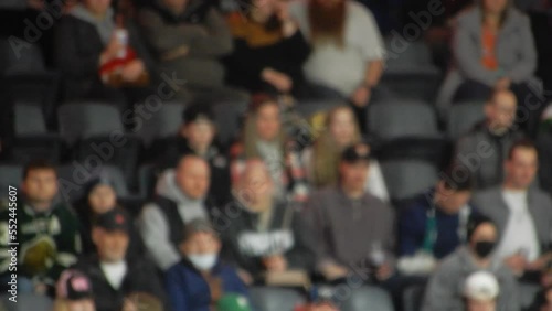 Wallpaper Mural People Sitting Down In Arena Seats Bleachers Watching Hockey Game Some Wear Masks 002 Torontodigital.ca