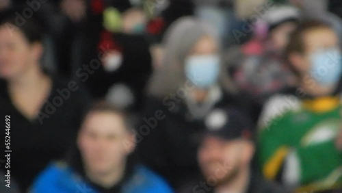 Wallpaper Mural People Wearing Masks At Hockey Game As Other Players Enjoy Game Torontodigital.ca